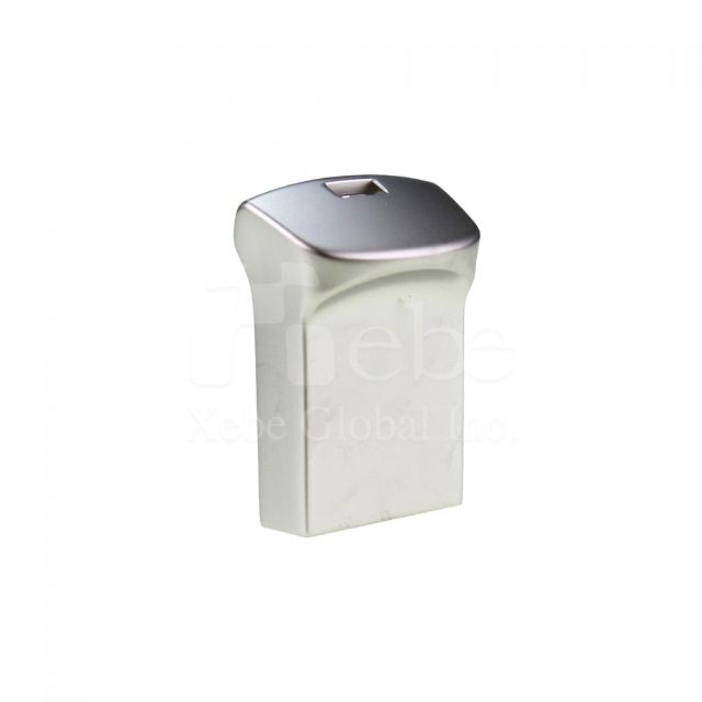 silver uncapped mini flash drive